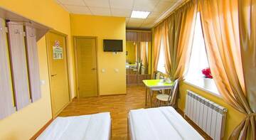 Улучшенный двухместный номер с 2 отдельными кроватями в Гостинице Уют